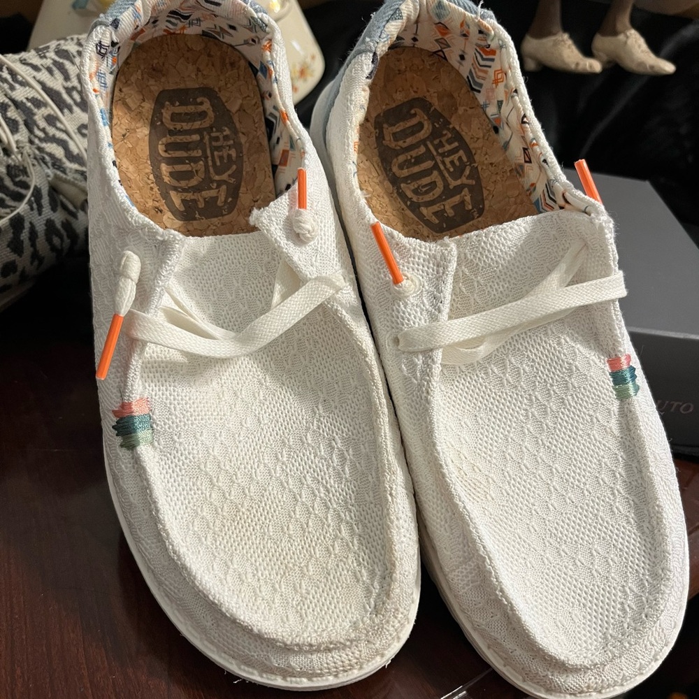 Hey dude white women with blue and orange tip laces